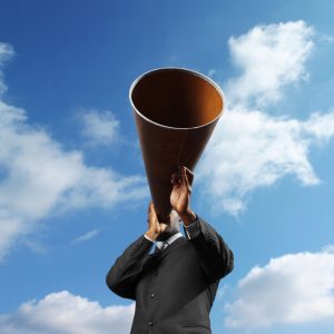 Man Holding Loudspeaker